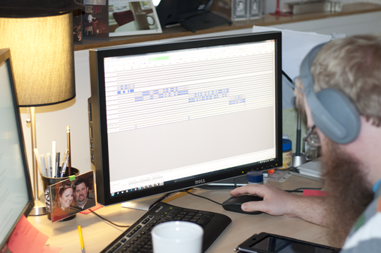 producer Bryan Garvin in the editing room