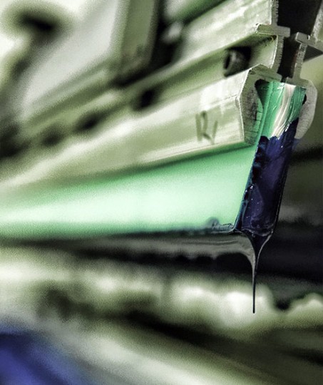 cyan close up of cyan ink on the squeegee